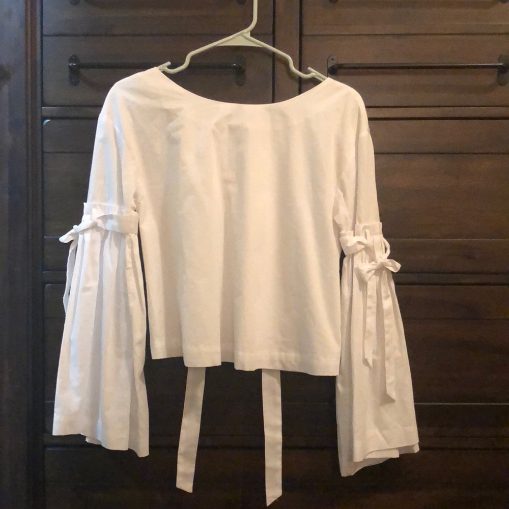 white bow sleeve top